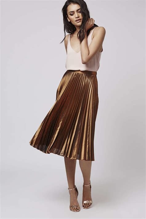 Midi skirt - Topshop Leopard Print Organza Midi Skirt $42.98 at nordstrom.com This leopard print skirt is completely different than the others on this list thanks to the printed sheer organza material.